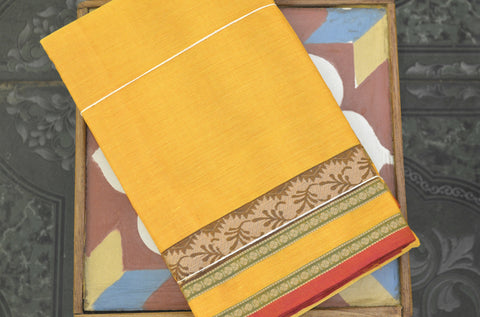Yellow cotton saree with small border motifs having a rust orange border