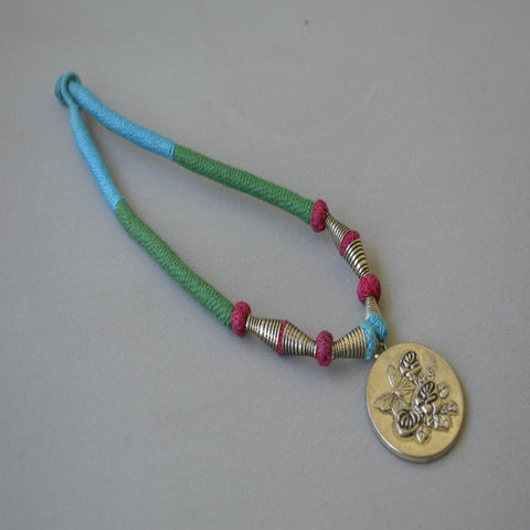 Beautiful Embossed Roses Thread Pendant