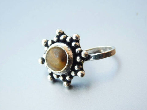 Star Brown Pressing Style Nose Pin